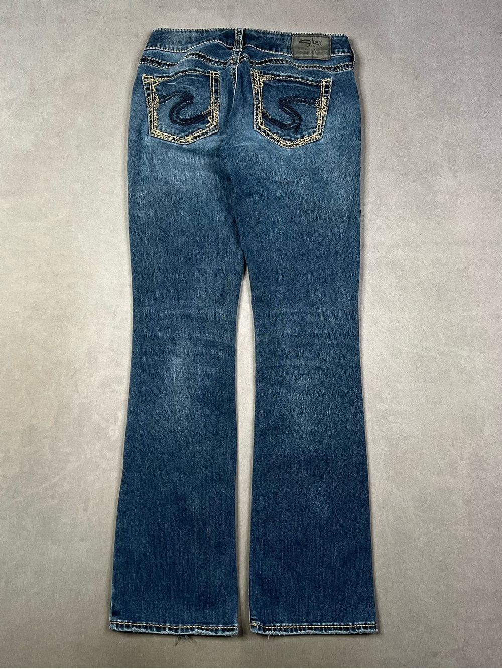 Silver Jeans Medium Blue Flare Jeans with Embroidered Back Pockets